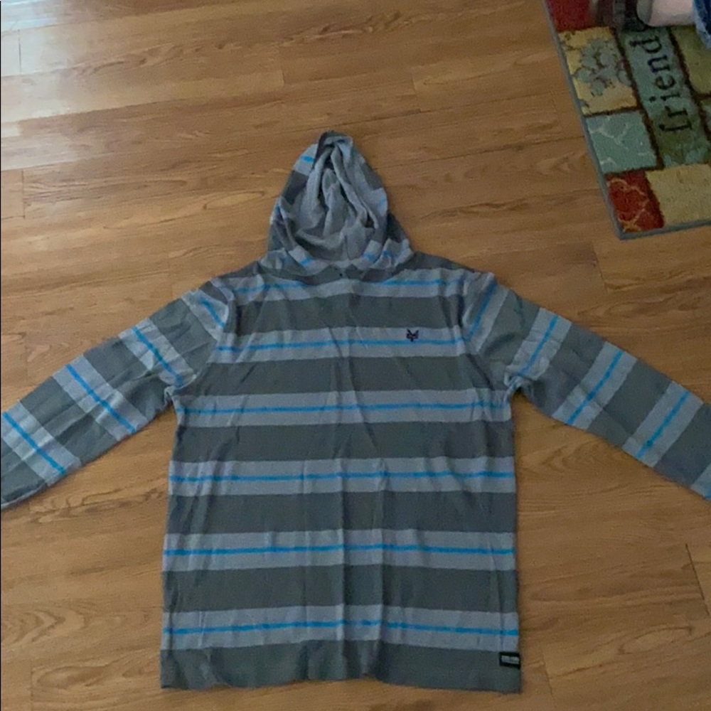 A long sleeve shirt w/ a hood.